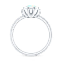 Ethiopian opal engagement ring for women with 1.5 carats, featuring a Rosec Jewels ring design and sparkling gemstone setting.