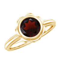 Round cut garnet flower engagement ring for women, featuring a 1.7 carat gemstone set in a delicate rose gold band.
