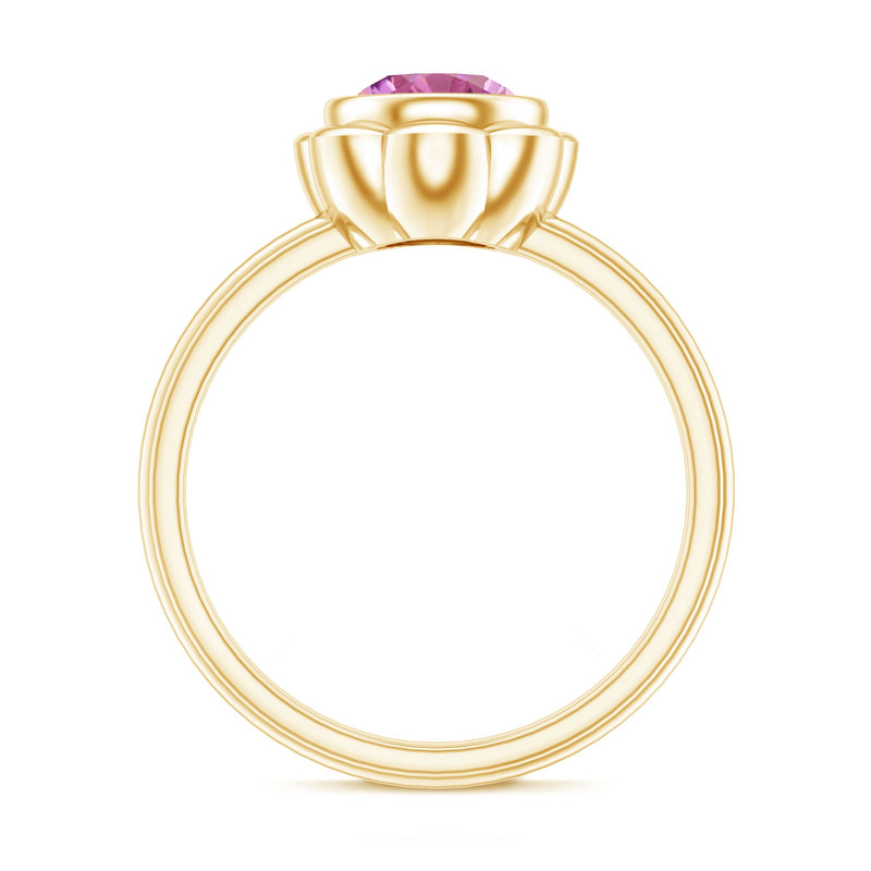 Round pink tourmaline flower engagement ring with 1-carat center stone and delicate band from Rosec Jewels.