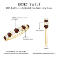 Natural garnet and diamond heart eternity ring in east-west style by Rosec Jewels, showcasing a delicate band with vibrant gemstones.