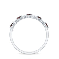 Natural garnet diamond heart eternity ring in east-west style, showcasing Rosec Jewels' elegant design with sparkling gemstones.