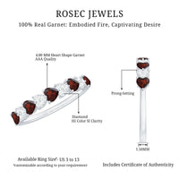 Natural garnet diamond heart eternity ring in east-west style, Rosec Jewels, with sparkling gemstones and intricate band design.