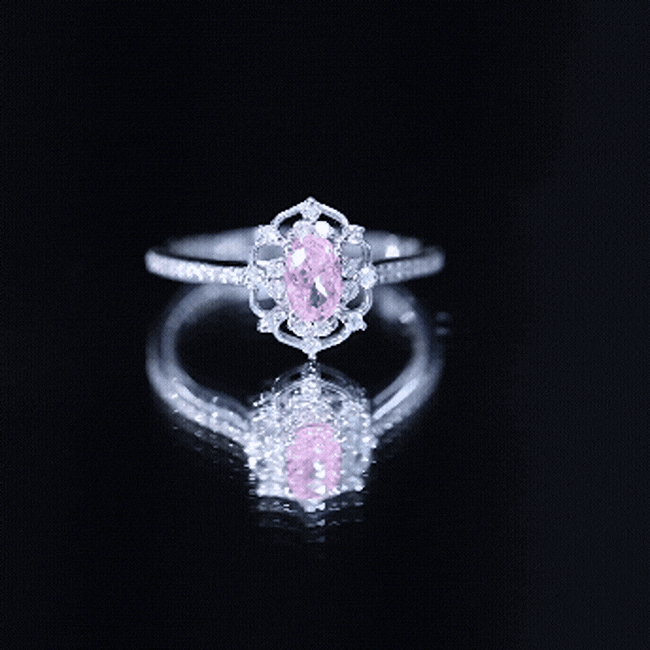 Natural pink sapphire and diamond vintage engagement ring in silver with intricate detailing, by Rosec Jewels.