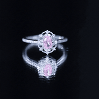 Natural pink sapphire and diamond vintage engagement ring in silver with intricate detailing, by Rosec Jewels.