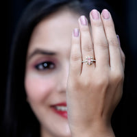 Natural pink sapphire and diamond vintage engagement ring in silver from Rosec Jewels, showcasing intricate design and sparkling stones.