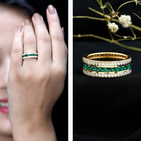 Lab-grown emerald eternity wedding band with three rows of sparkling emeralds, crafted by Rosec Jewels.