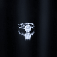 Yellow gold solitaire engagement ring featuring a 6x8mm oval moissanite gemstone, crafted by Rosec Jewels.