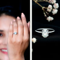 Certified 6x8mm oval moissanite solitaire engagement ring by Rosec Jewels, showcasing the elegant ring design with a prominent gemstone.