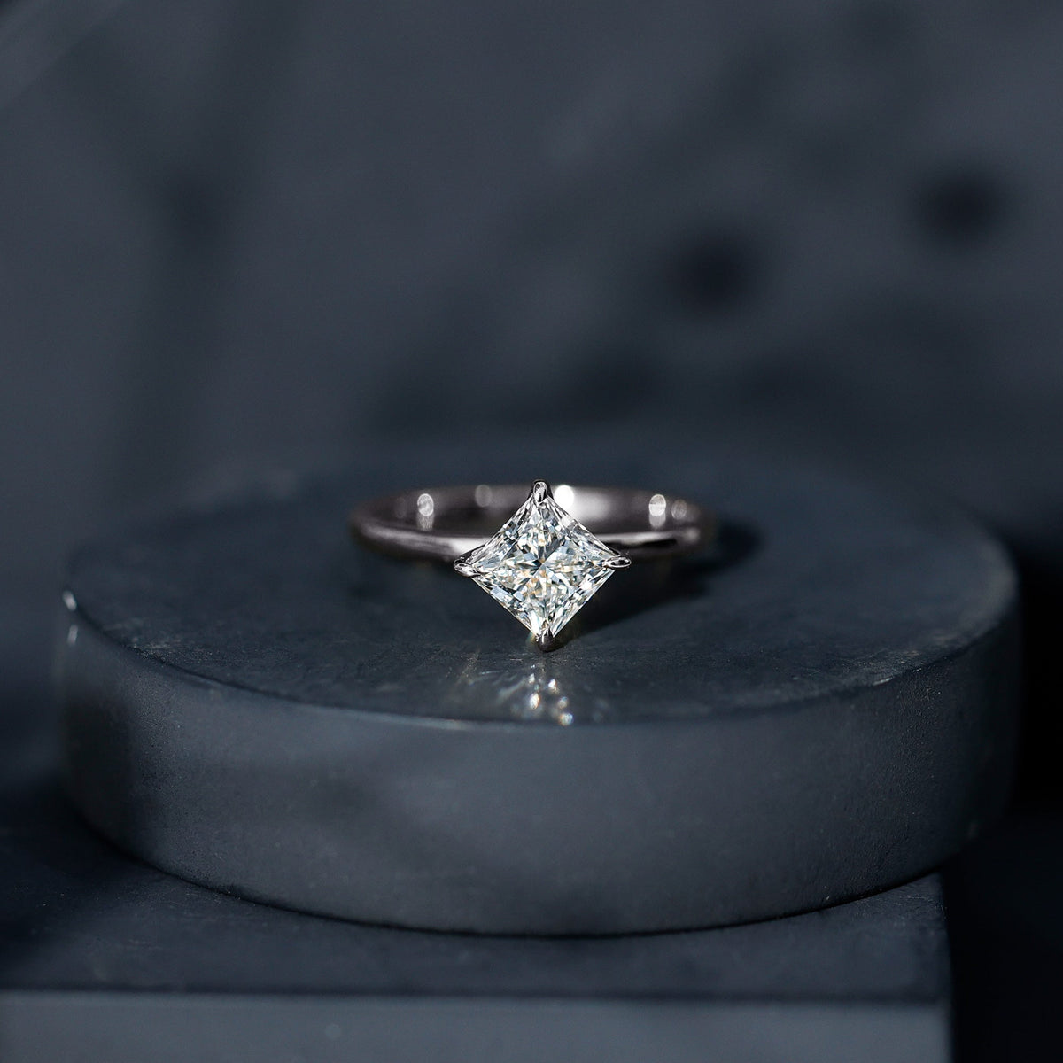 Elegant 1.25 CT princess cut lab-grown diamond solitaire engagement ring by Rosec Jewels with a sleek band.