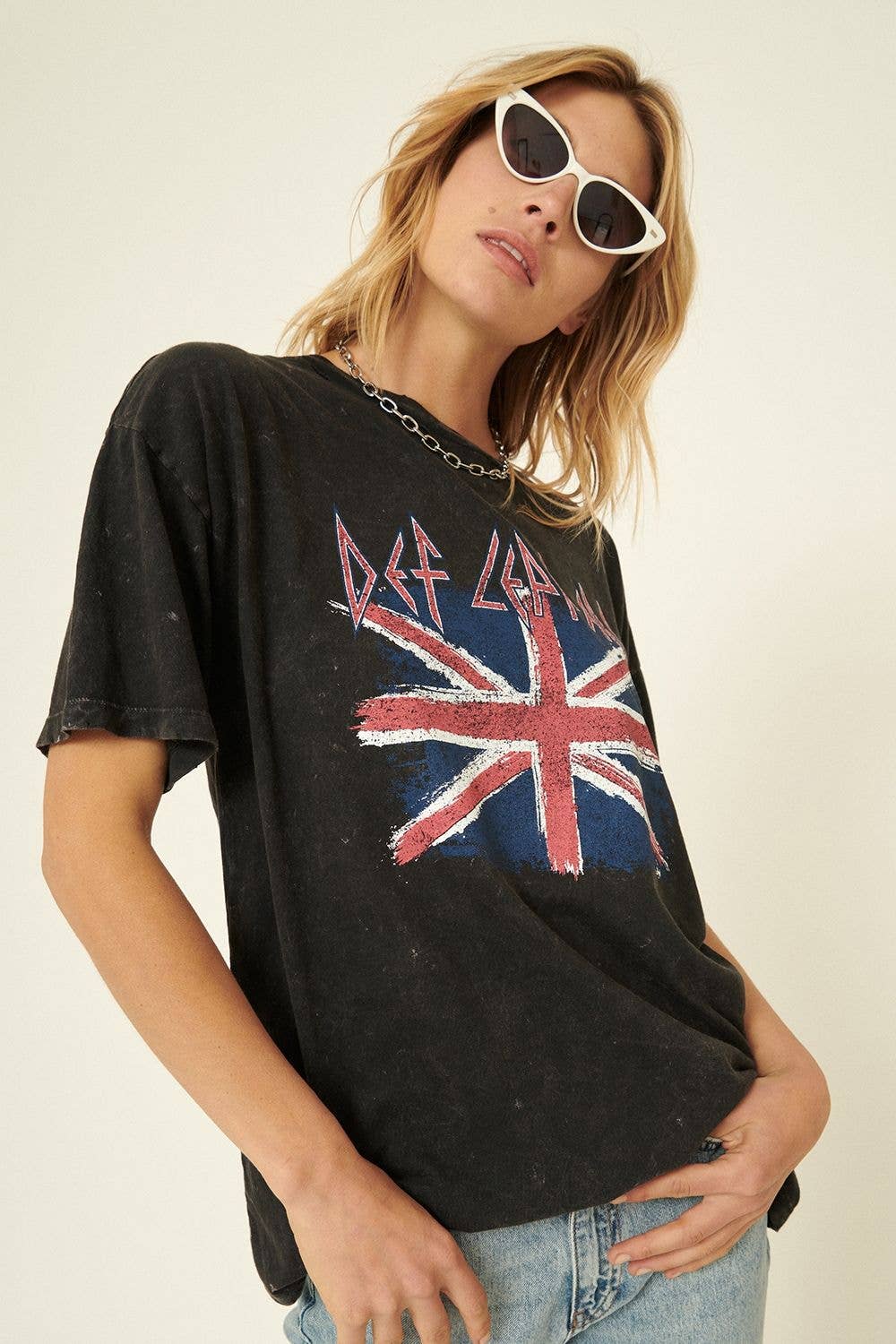 Rosie Karma Def Leppard Union Jack distressed t-shirt featuring bold graphic print and casual fit, shown on a hanger.