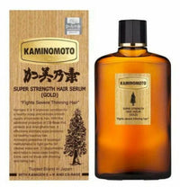 Kaminomoto Super Strength Hair Serum Gold bottle for hair loss treatment, featuring gold accents and applicator tip.