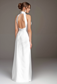 Elegant satin mini wedding dress by SelenaHuanStudio featuring halter neckline, open back, thigh split, perfect for modern bridal looks.