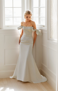 Elegant off-the-shoulder fit and flare duchess satin wedding dress by SelenaHuanStudio, featuring a simple and sophisticated design.