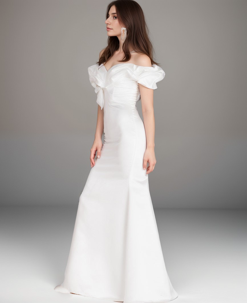 Elegant off-the-shoulder ruffled trumpet wedding dress by SelenaHuanStudio, made of silky satin for a simple, sophisticated look.