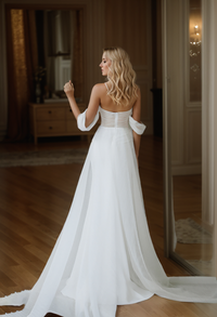 SelenaHuanStudio goddess off-the-shoulder satin wedding dress with small train and tulle ribbon for mini wedding occasions.