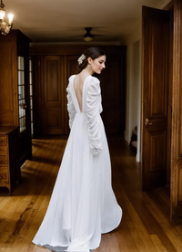 SelenaHuanStudio chiffon long sleeve wedding gown with draped sleeves and deep V back, perfect for a minimalist miniwedding.