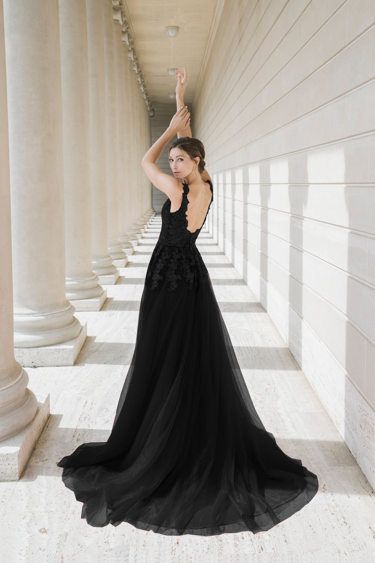 Black Queen prom gown by SelenaHuanStudio featuring a V-neck lace bodice, lightweight fabric, low back, and A-line silhouette.
