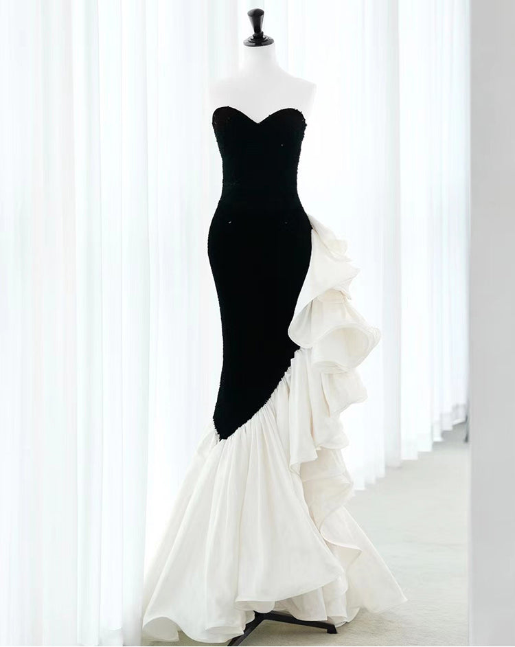 Black strapless sequin mermaid prom dress with ruffled organza by SelenaHuanStudio, featuring a fitted silhouette and elegant design.