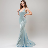 Silky satin mermaid prom dress with deep V-neck and tie-back design, featuring a fitted silhouette and elegant style.