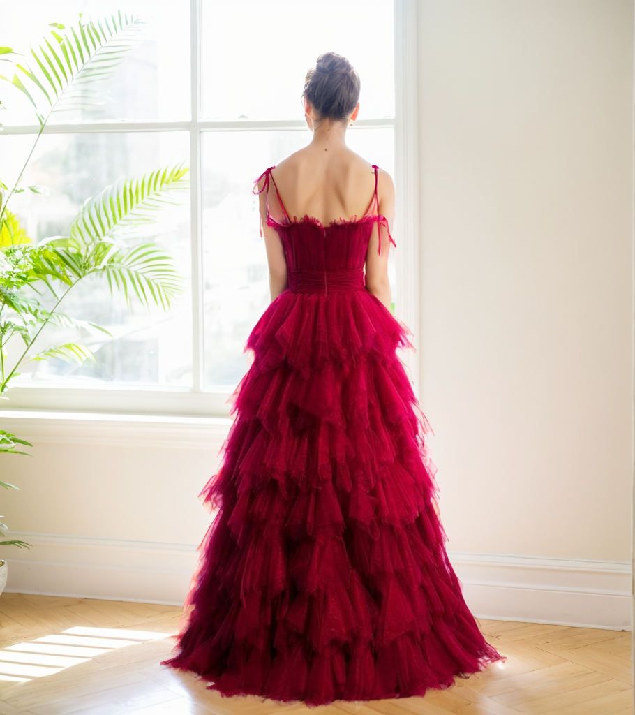 SelenaHuanStudio spaghetti-strap prom dress with pleated bodice, ruffle layers, and soft tulle tutu for formal occasions