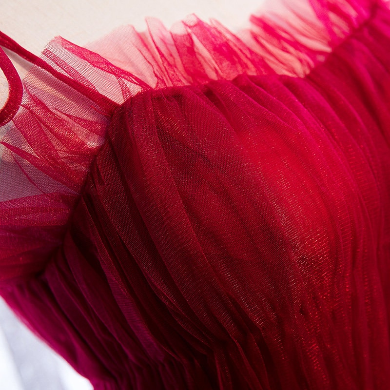 Elegant prom dress by SelenaHuanStudio with spaghetti straps, pleated bodice, ruffle layered soft tulle, perfect for formal events.