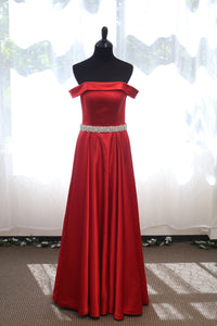 Off-shoulder ruby red satin prom dress with crystal beaded sash by SelenaHuanStudio, featuring an A-line silhouette and elegant design.