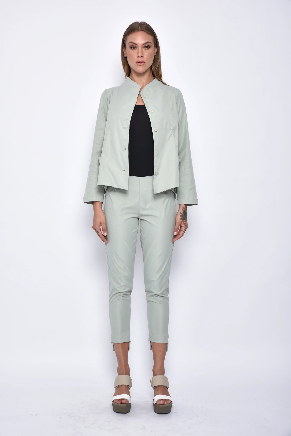 Light green Asia Pants by SIMPLY MILA, modern women's bottoms featuring a relaxed fit and stylish design.