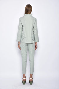Back view of SIMPLY MILA Asia Pants, modern women's bottoms in sage green fabric with relaxed fit and stylish design.
