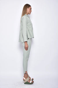 Side view of beige Asia pants by SIMPLY MILA Modern Women's Clothing, stylish bottoms with a relaxed fit and comfortable fabric.