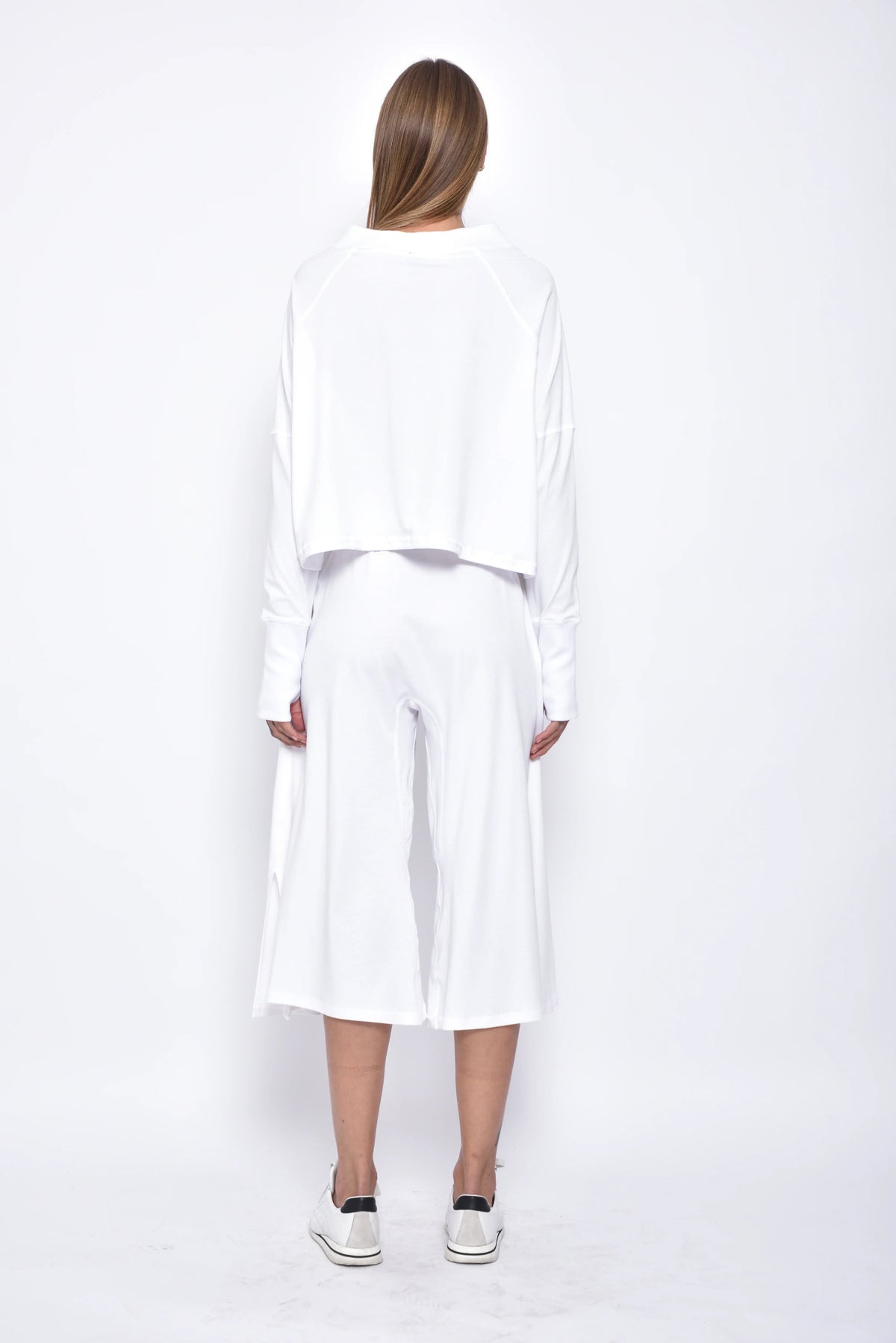 Back view of SIMPLY MILA Zoe Pants, modern women's casual bottoms in a relaxed fit, showcasing their stylish design.