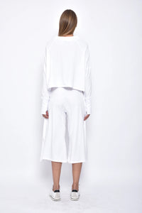 Back view of SIMPLY MILA Zoe Pants, modern women's casual bottoms in a relaxed fit, showcasing their stylish design.