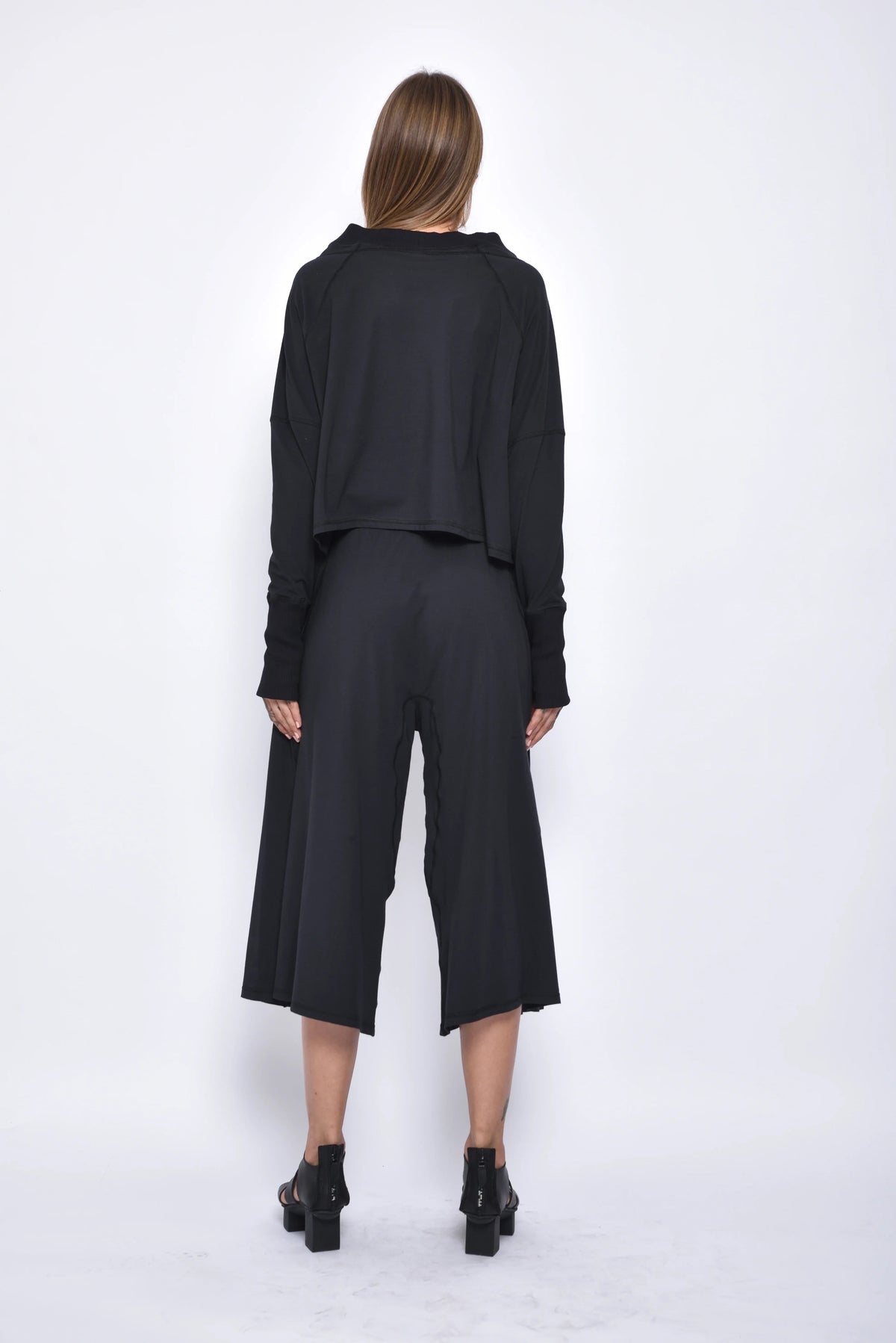 Back view of SIMPLY MILA Zoe Pants in stylish women's bottoms, featuring a tailored fit and modern design.