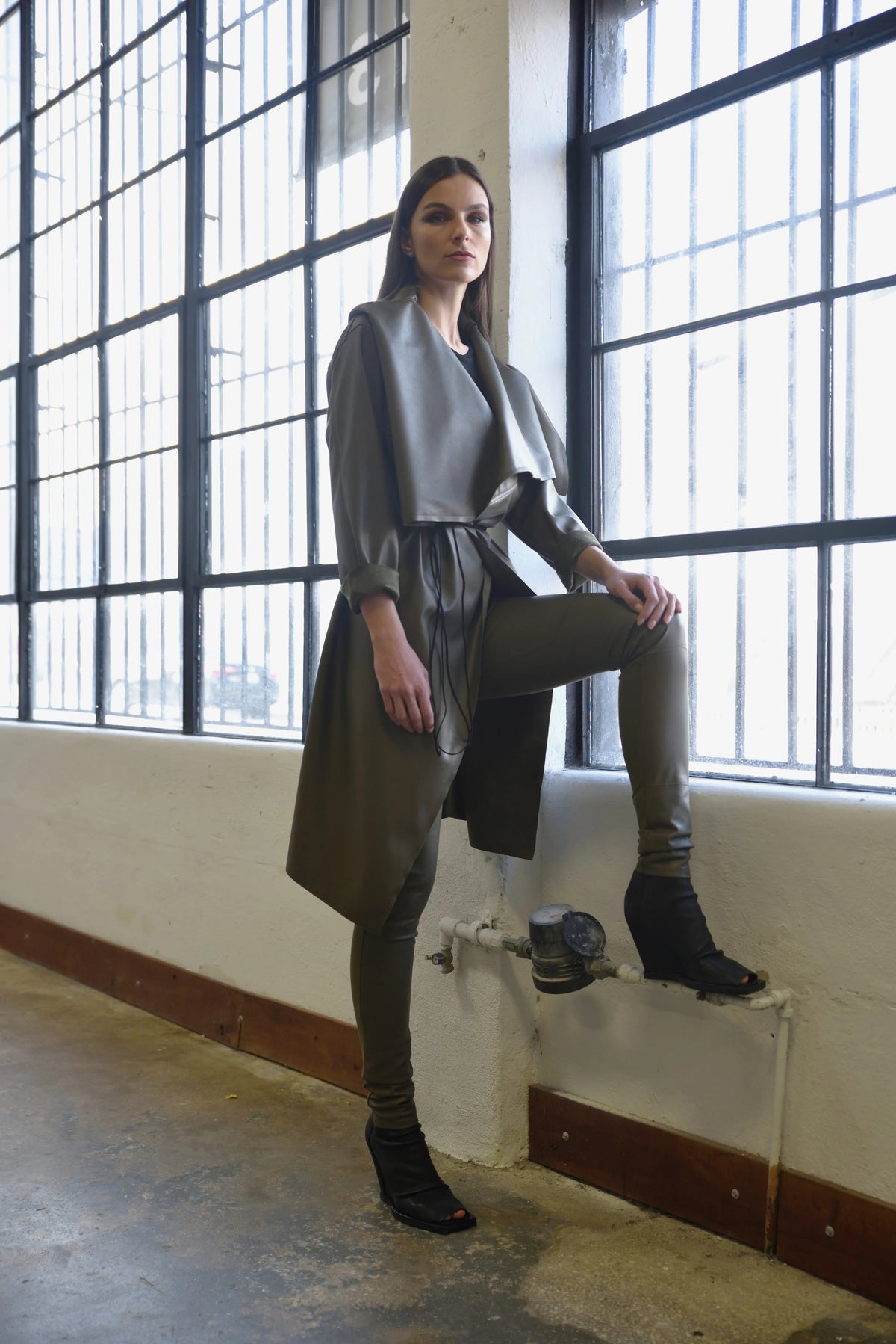 Uneven coat by SIMPLY MILA Modern Women's Clothing featuring a stylish, textured design in neutral tones.