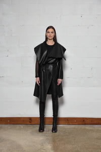 Uneven coat by SIMPLY MILA Modern Women's Clothing, featuring a stylish, asymmetrical design in neutral fabric.