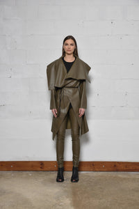 Simply Mila modern women's uneven coat shown in a stylish, textured design with a relaxed fit and unique asymmetrical hem.