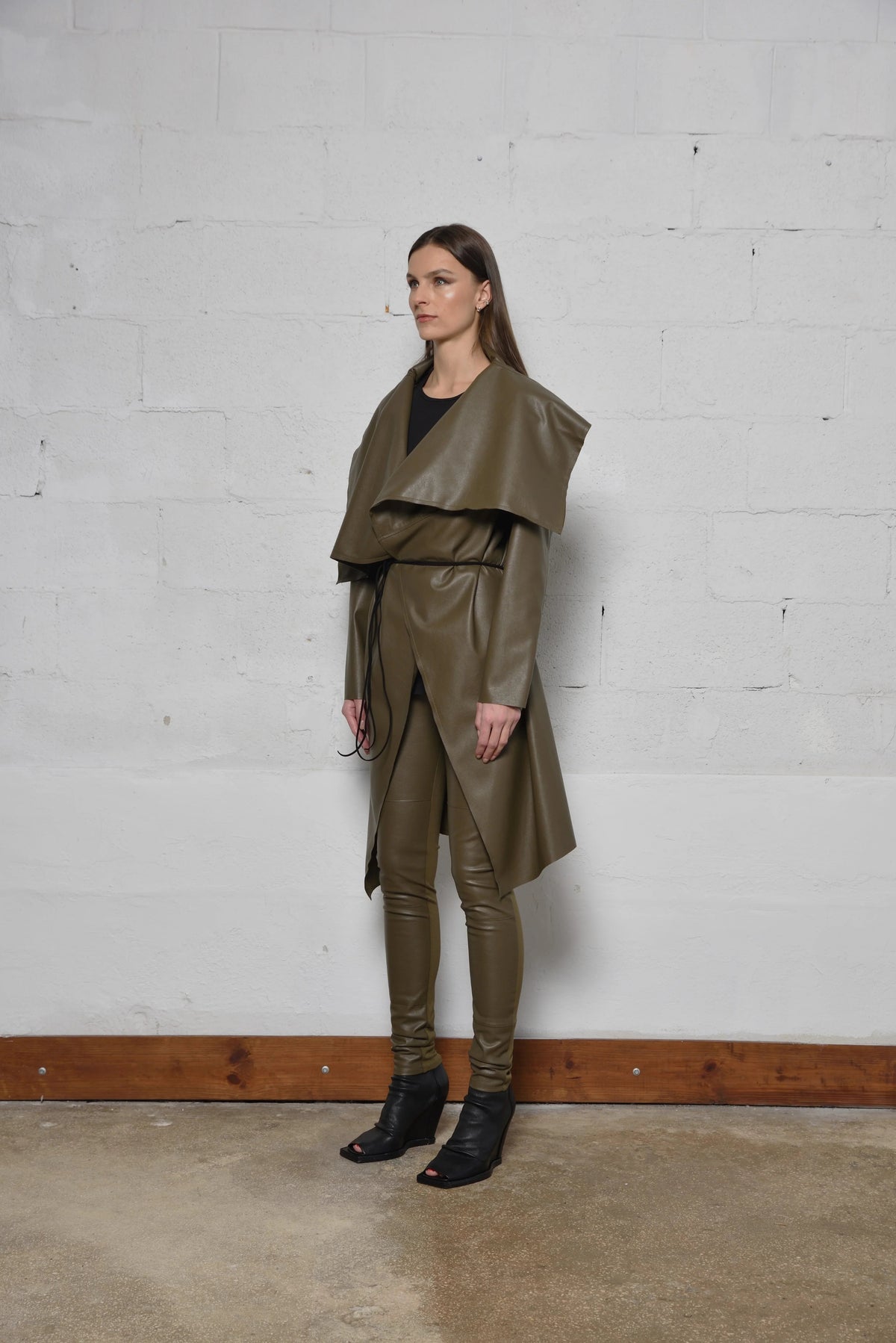 Simply Mila modern women's uneven coat featuring a stylish, textured design with a tailored fit and contemporary silhouette.