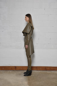 Uneven coat from SIMPLY MILA Modern Women's Clothing featuring a stylish, textured design and a relaxed fit.