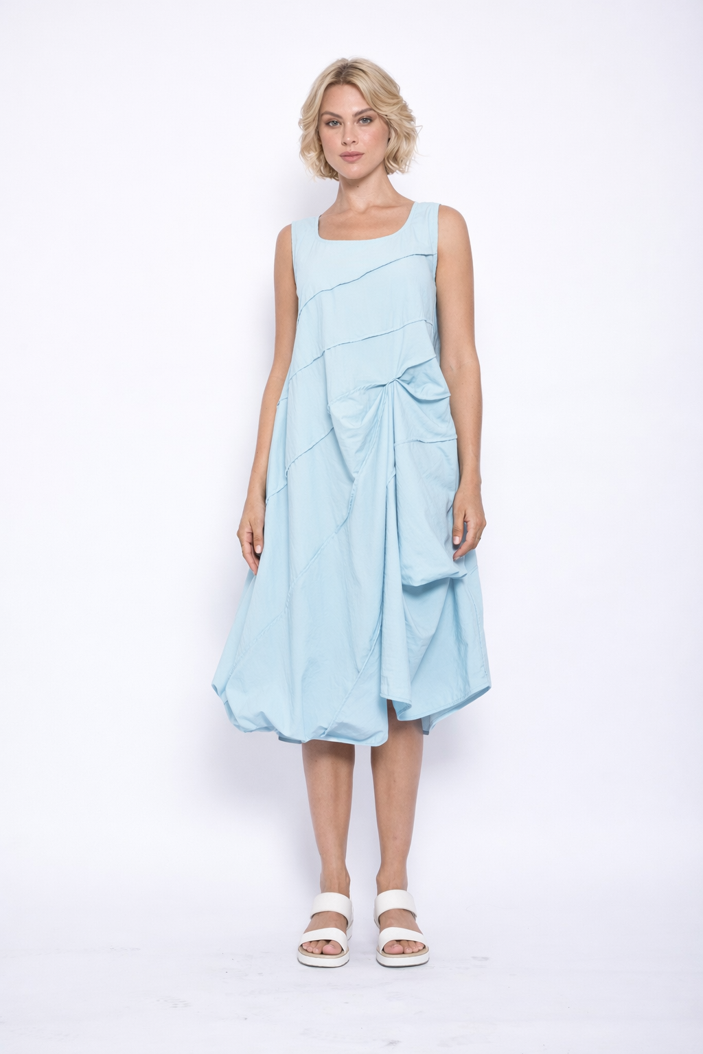 Elegant Lydia dress by SIMPLY MILA Modern Women's Clothing featuring a flowing fabric and stylish design.