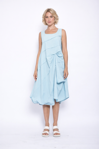 Elegant Lydia dress by SIMPLY MILA Modern Women's Clothing featuring a flowing fabric and stylish design.