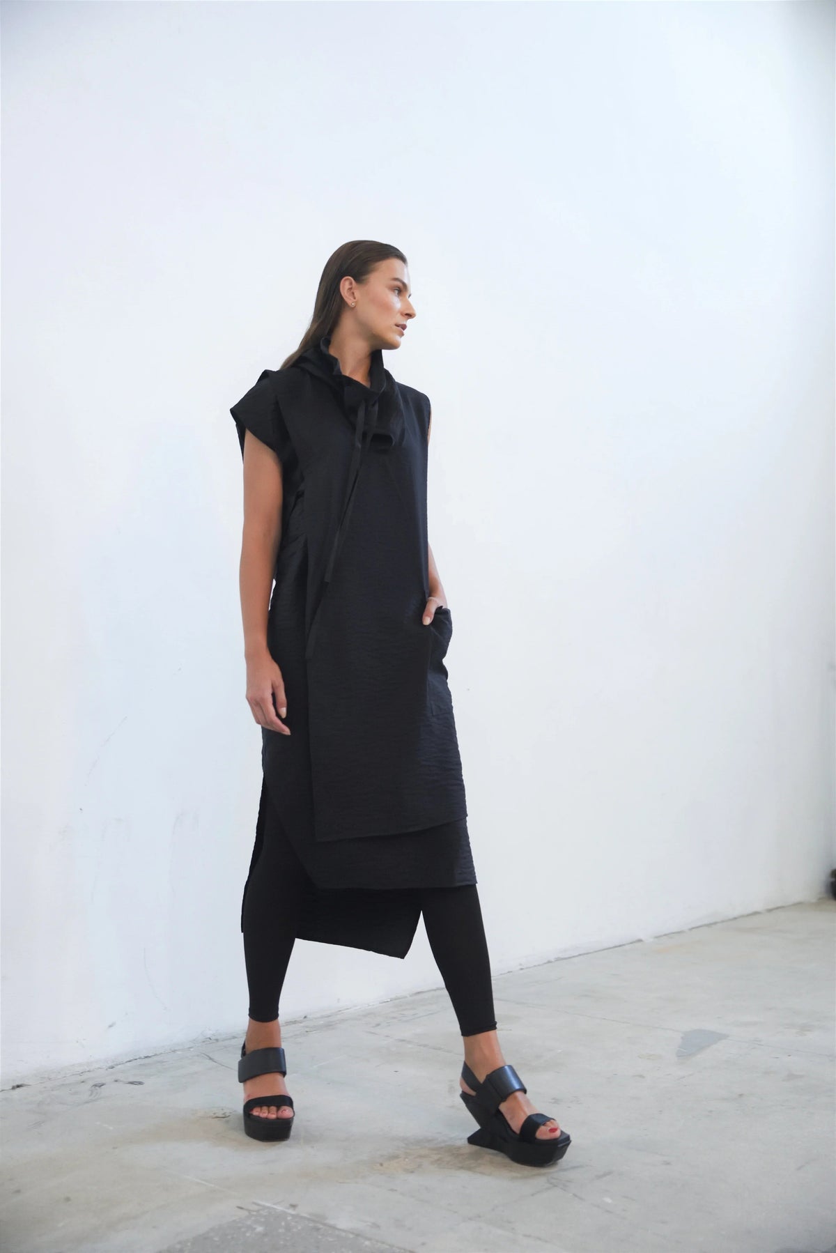 Elegant Evolution Dress by SIMPLY MILA, showcasing a stylish modern women's dress with a flattering fit and contemporary design.