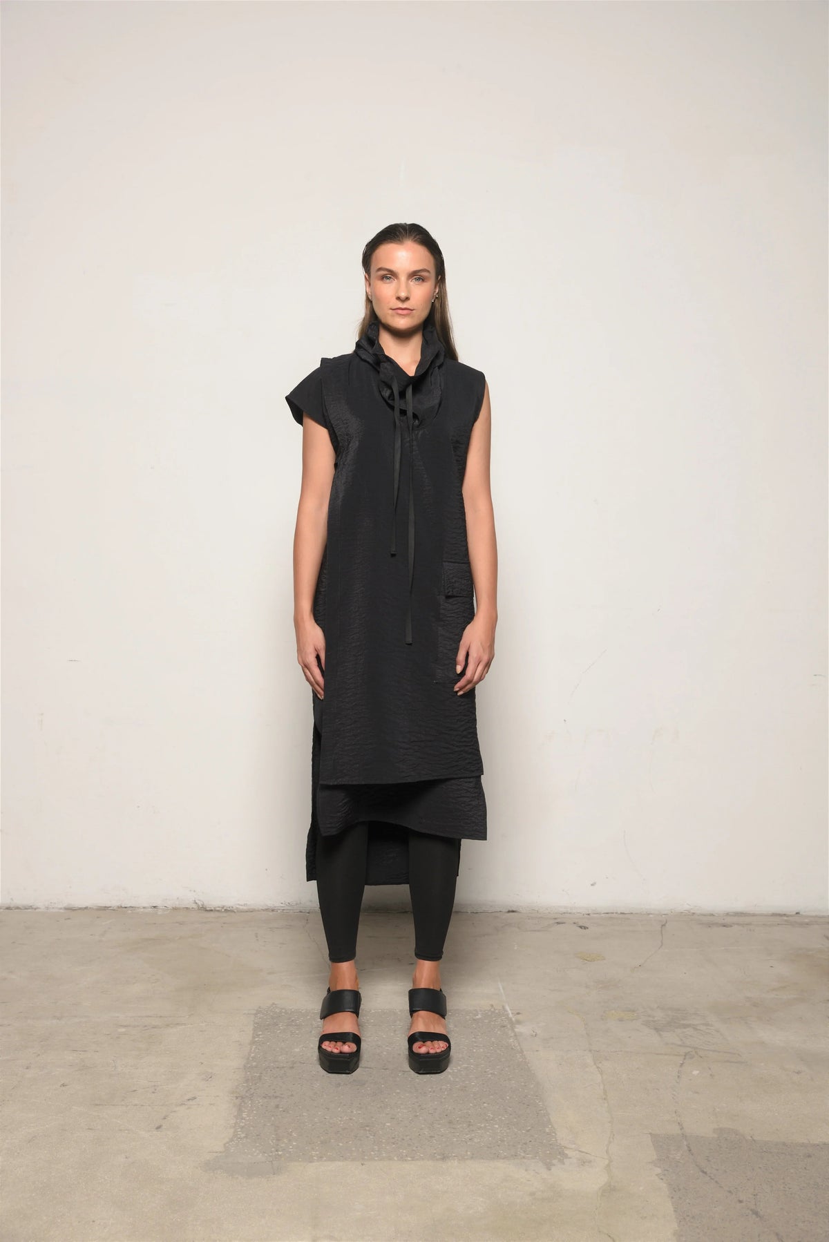 Simple black Evolution dress from SIMPLY MILA Modern Women's Clothing, featuring a stylish, fitted silhouette.
