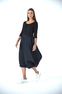 Elegant Babylon dress by SIMPLY MILA, featuring a flowing design suitable for modern women's fashion, shown in the image.
