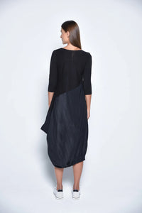 Elegant Babylon dress by SIMPLY MILA Modern Women's Clothing, featuring a stylish design and flowing fabric.