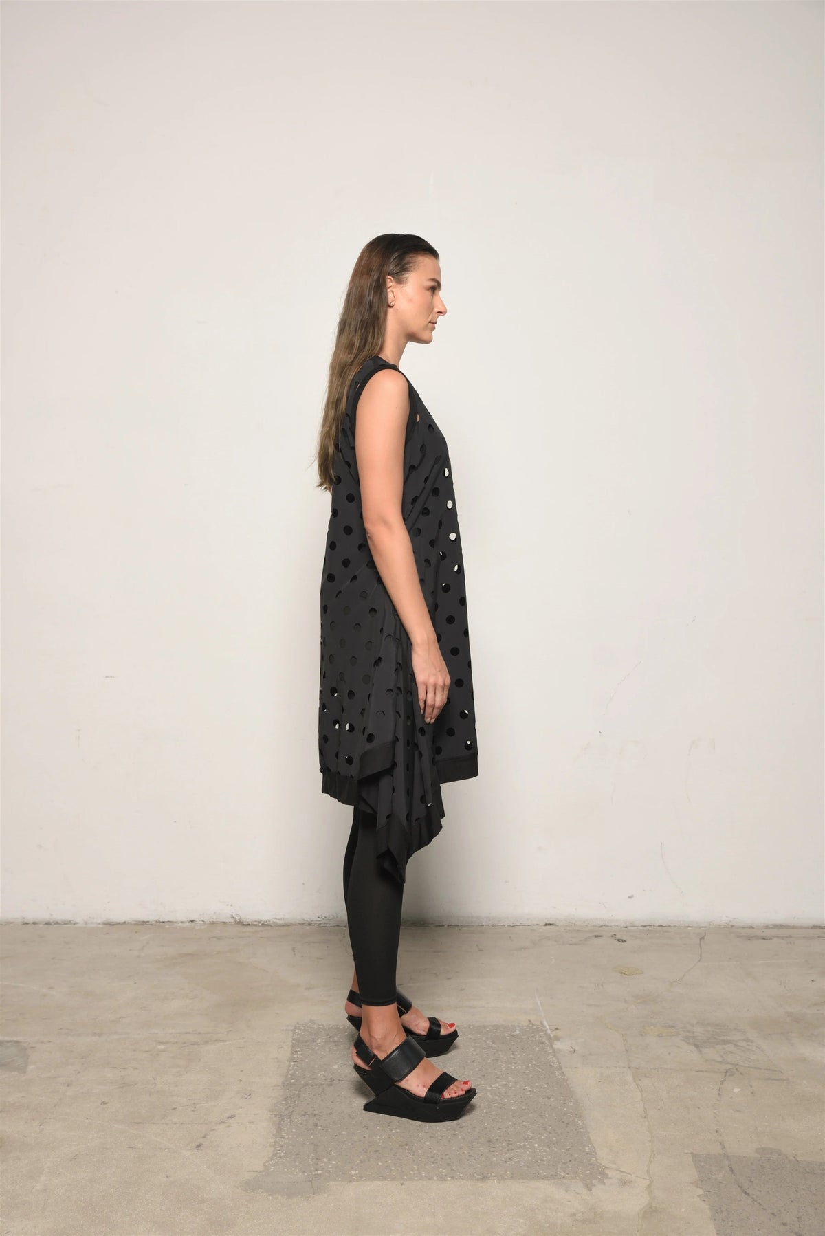 Perforated tunic dress from SIMPLY MILA Modern Women's Clothing, featuring lightweight, breathable fabric and stylish design.