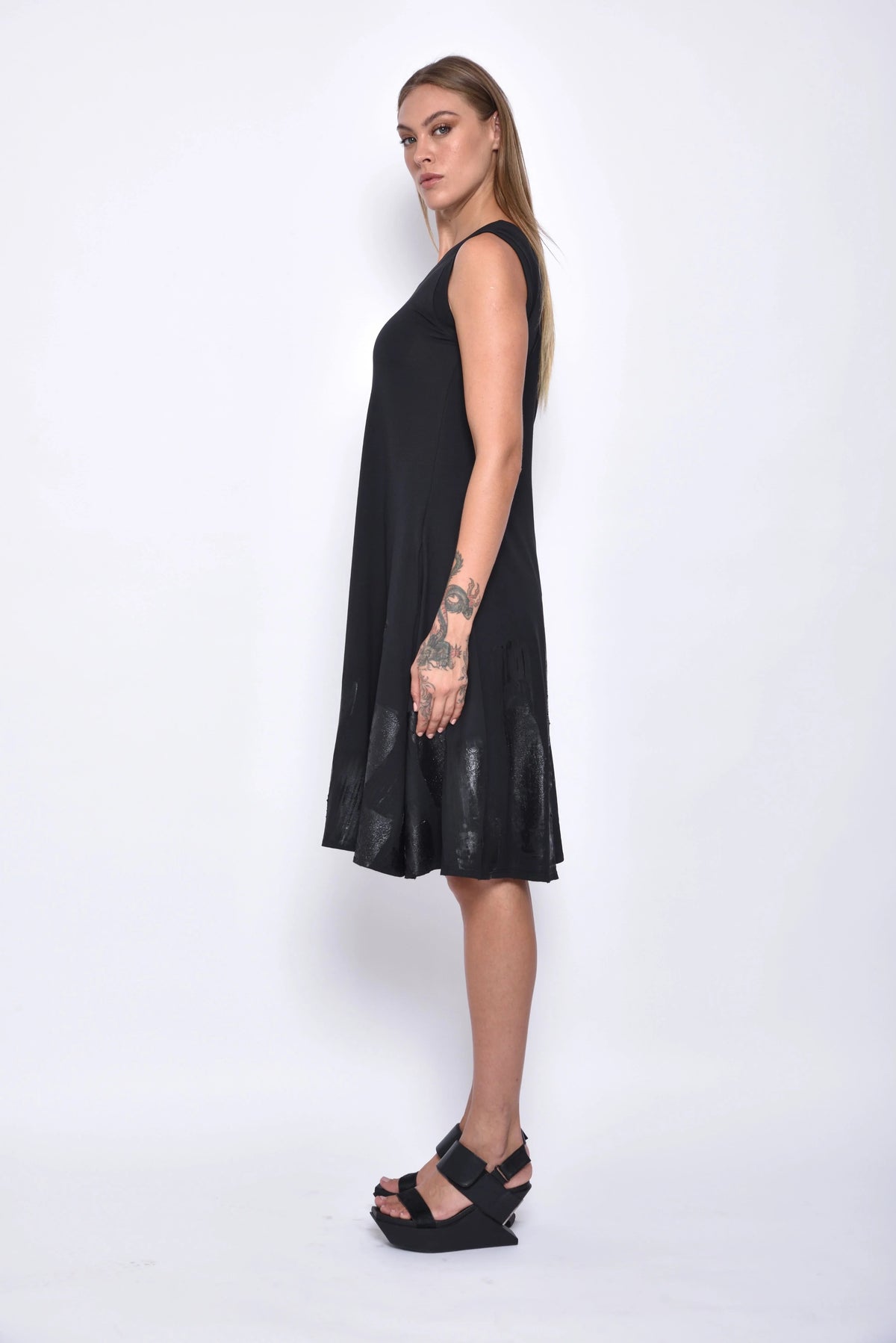 Side view of the Skycraper dress by SIMPLY MILA Modern Women's Clothing, showcasing its stylish design and fit.