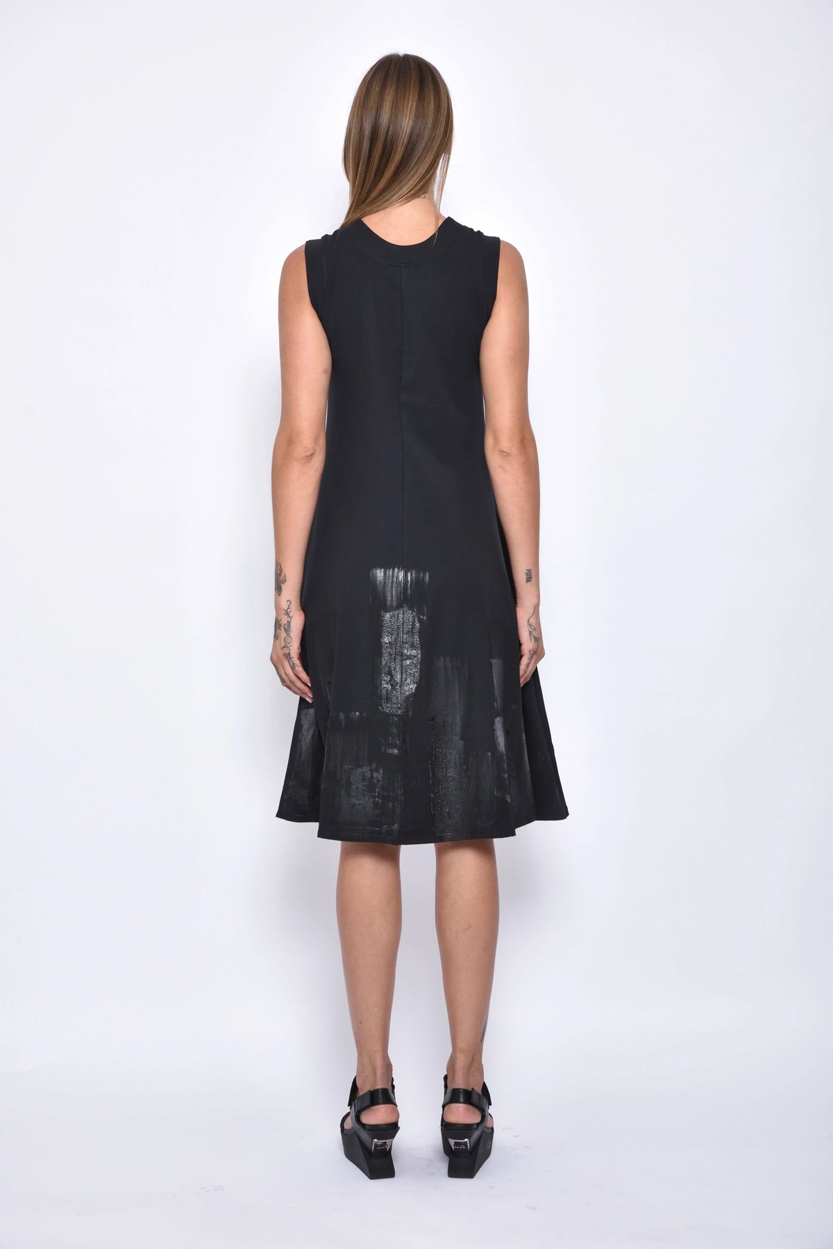 Back view of the Skycraper dress by SIMPLY MILA Modern Women's Clothing, showcasing the stylish dress design.