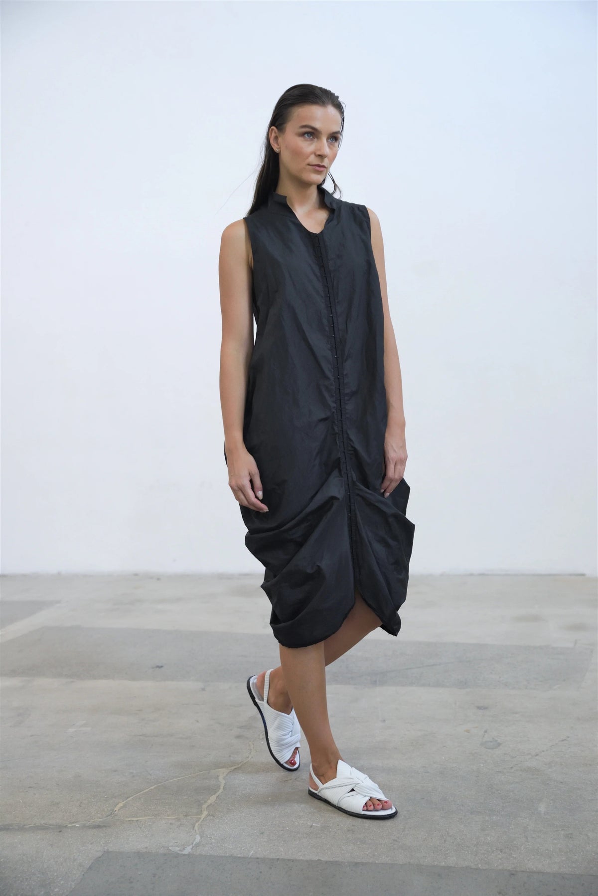 Simply Mila Athena dress, modern women's dress in stylish fabric with a flattering fit, displayed on a hanger.