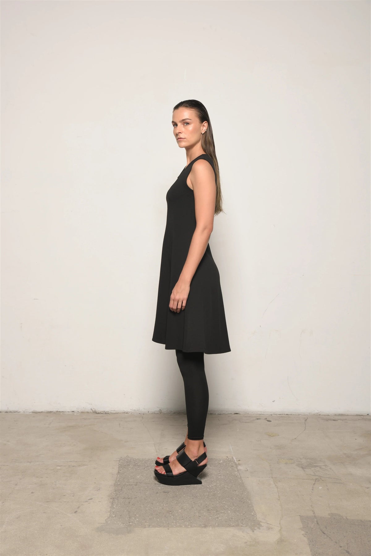 Sleeveless Traveler Dress by SIMPLY MILA, lightweight casual dress for women, shown in a natural pose with neutral background.