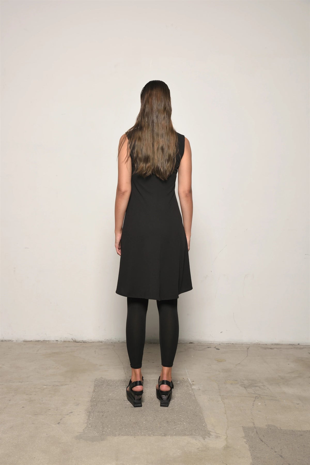 Sleeveless traveler dress from SIMPLY MILA Modern Women's Clothing, featuring a lightweight, casual design perfect for warm weather.
