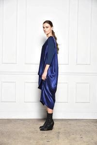 Midnight draped dress from SIMPLY MILA Modern Women's Clothing, featuring flowing fabric and elegant silhouette.